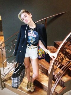 Miley  Ray  Cyrus  One  real.  Busy